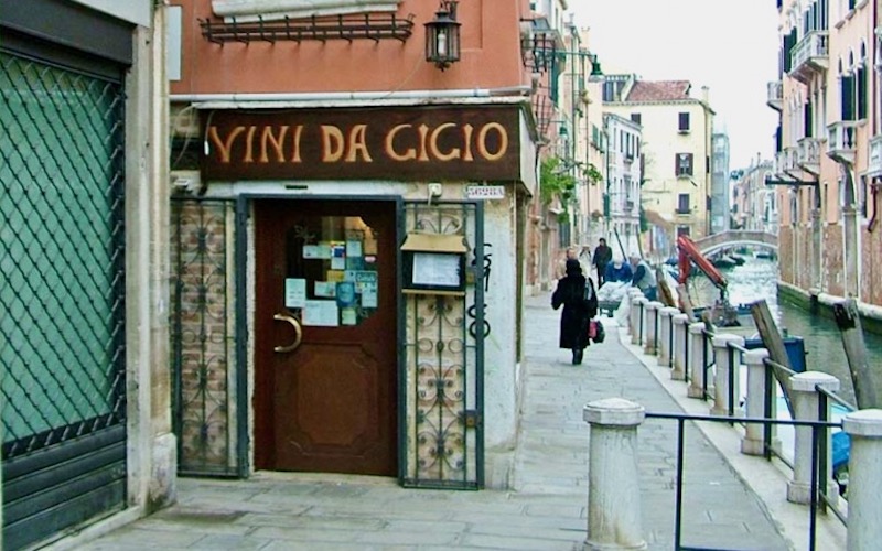 Entrance to Ristorante Vini da Gigio beside a canal - Venice Cheap Eats