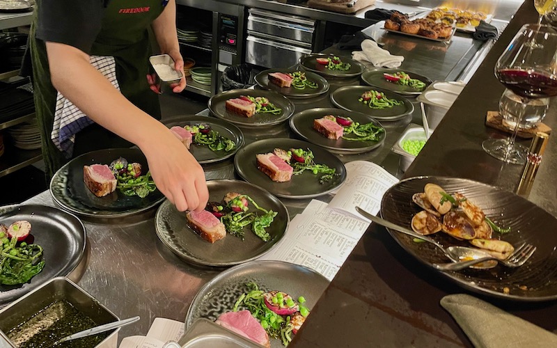 Counter Dining in Sydney - Firedoor - plating up lamb and greens