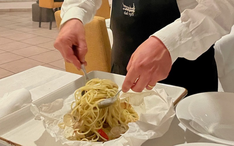 Best Dishes From Around The World 2024 - Spaghetti Vongole al Cartoccio (da Ciccio) being served tableside