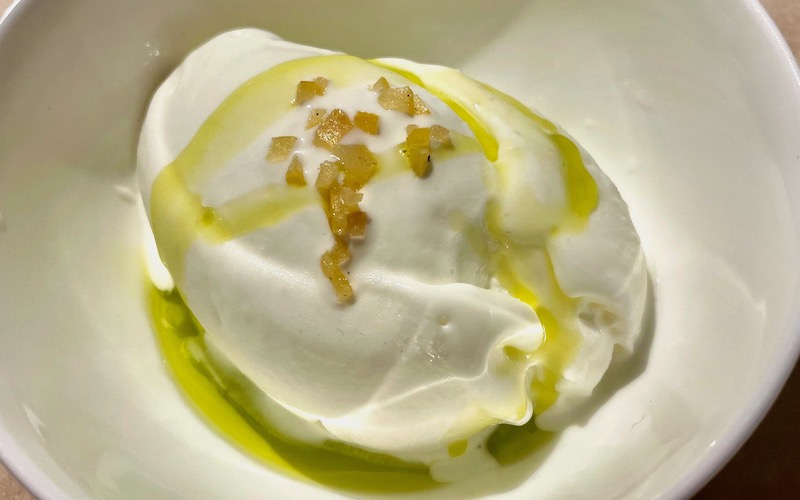 Best Desserts From Around The World 2024 - Sheep’s milk ice cream with salted lemon & evo (da Lucio)