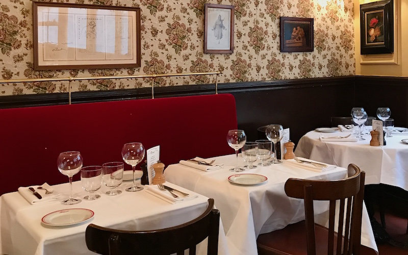 Tables set at Bistro Allard, one of the Best Bistros in Paris