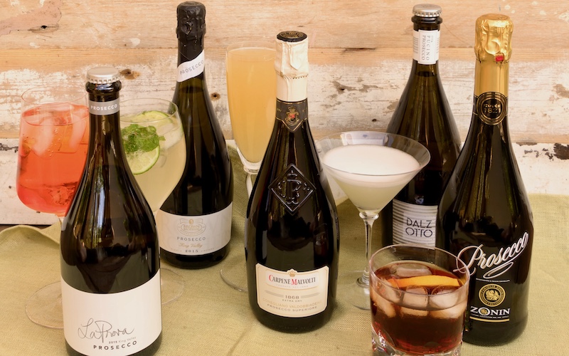 Best Prosecco Cocktails - Bellini, Aperol Spitz, Sgroppino, Sbagliato - Easy To Follow Recipes group shot of 5 cocktails with bottles