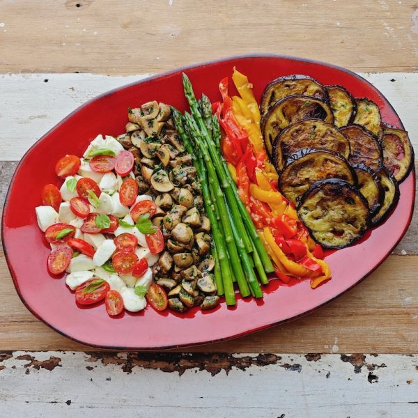 Vegetarian Antipasto Platter: insalata Caprese with Vannella buffalo bocconcini, funghi trifolati, steamed asparagus, peperoni in padella, melanzane grigliata