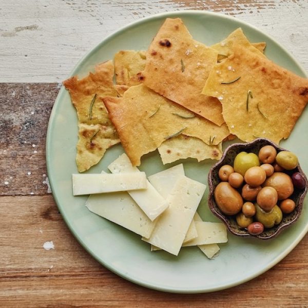 Pane Carasau, Rosemary, Olives, Pecorino – sprinkled with Olsson’s Sea Salt Flakes Pane Carasau, Rosemary, Olives, Pecorino - sprinkled with Olsson's Sea Salt Flakes